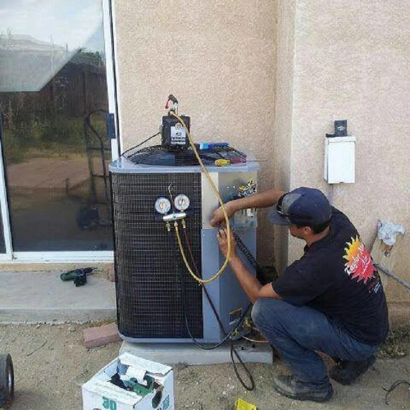 Taylor Made Air Inc technician providing air conditioning service repair in Victorville CA
